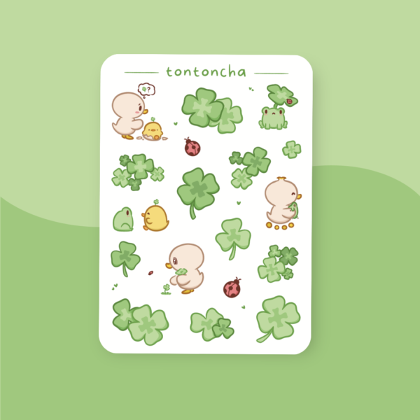 Sticker sheet with cute little ducklings, ladybugs and clovers